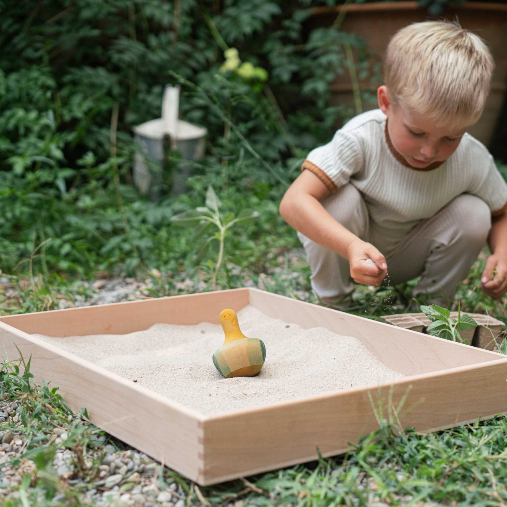 Grapat-Bird-Flowing-Yellow - In Sandpit